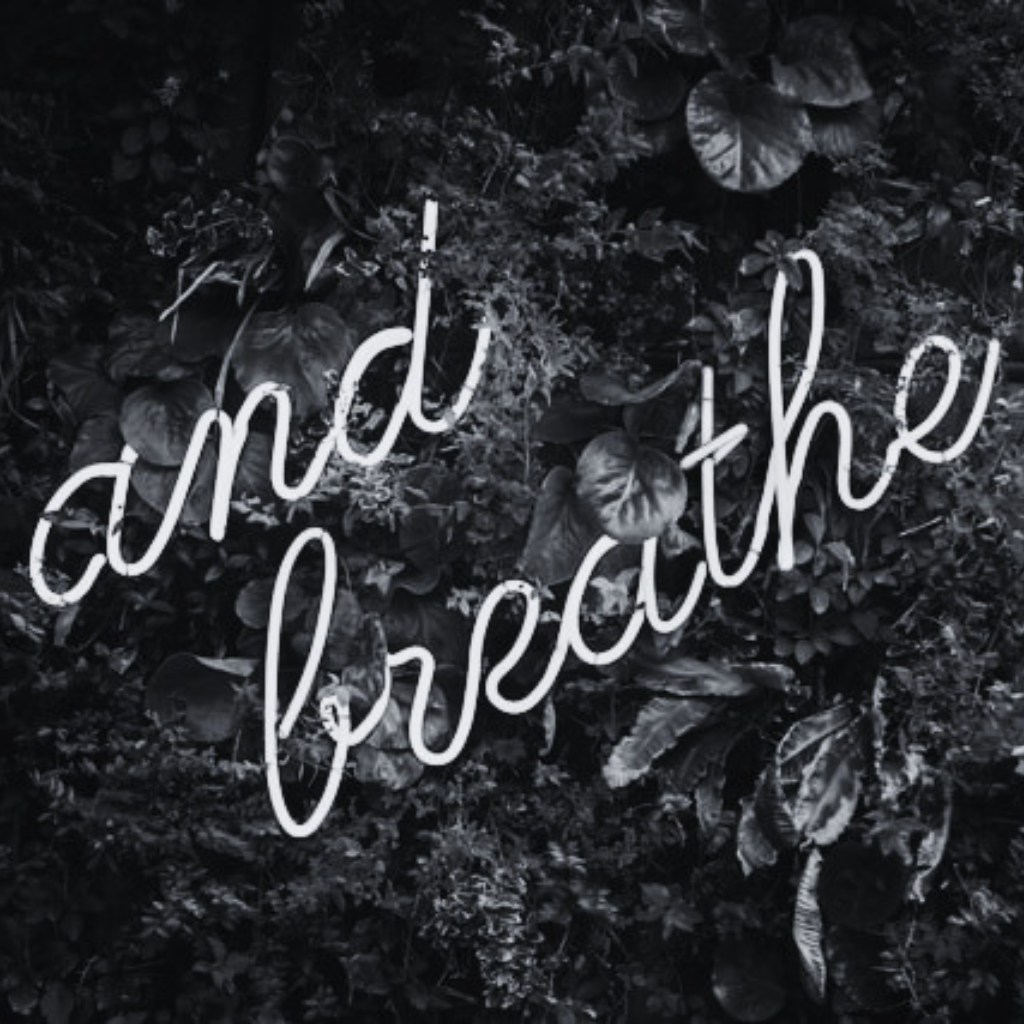 and-breathe-neon-sign Neon sign that reads
